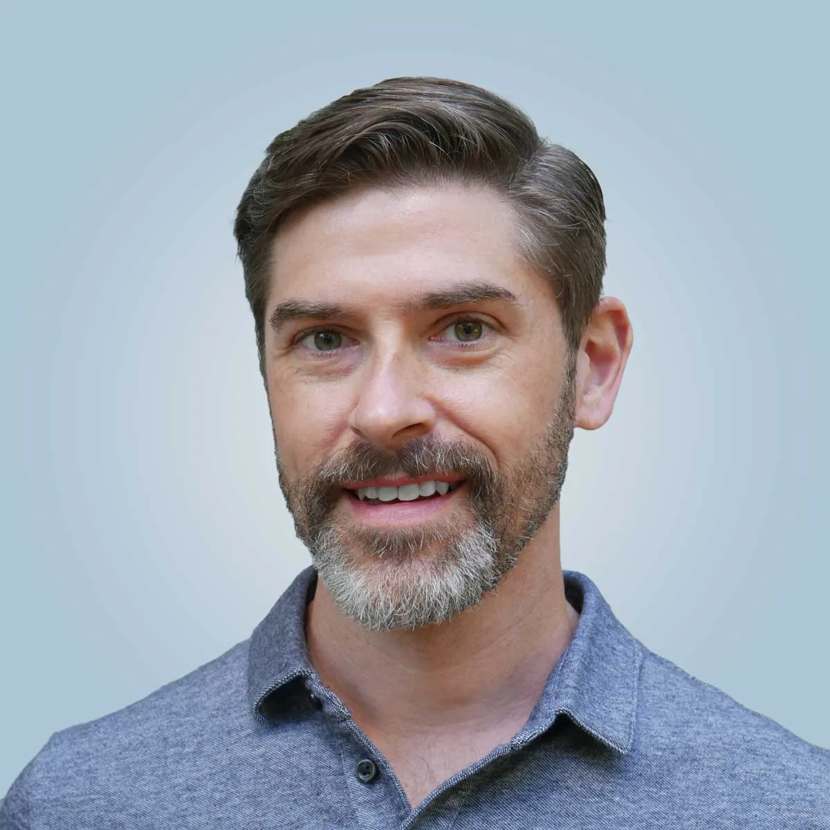 Dave Willard, founder of SiteChamp, wearing a blue polo shirt.
